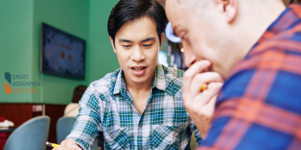 UK student discussing essay structure with a mentor